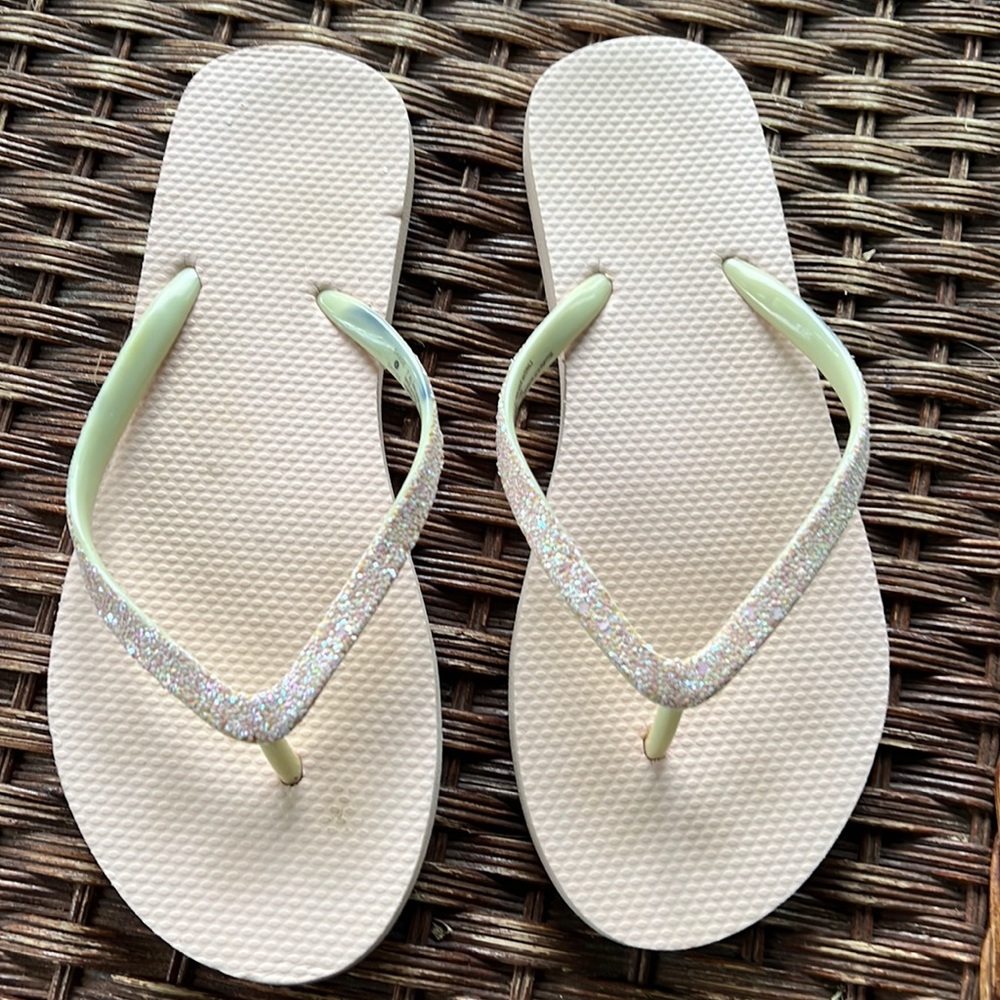 Size 7 pink sparkly flip-flops very good used